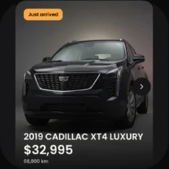 2019 Cadillac XT4 Luxury in black, front three-quarter view in a grey studio, the first slide of a carousel with its price.